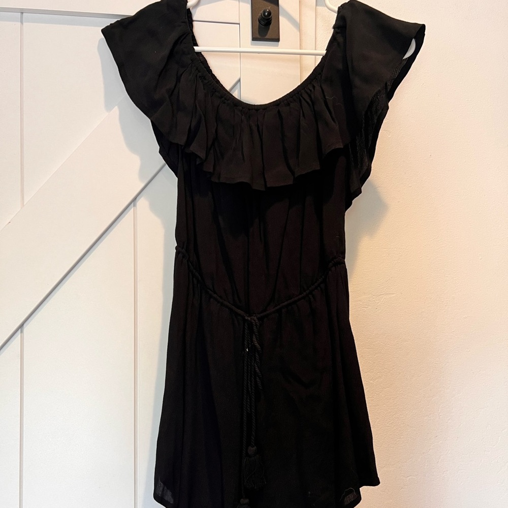 Black off the shoulder romper with ruffle sleeve